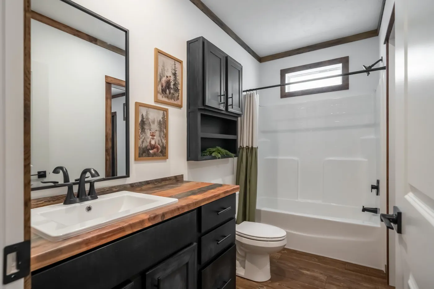 The THE MAGNOLIA Exterior. This Manufactured Mobile Home features 4 bedrooms and 3 baths.