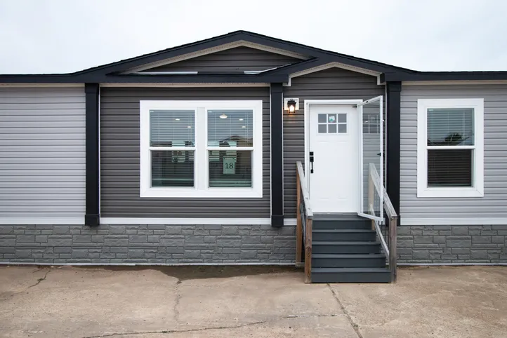 The HERCULES Exterior. This Manufactured Mobile Home features 4 bedrooms and 2 baths.