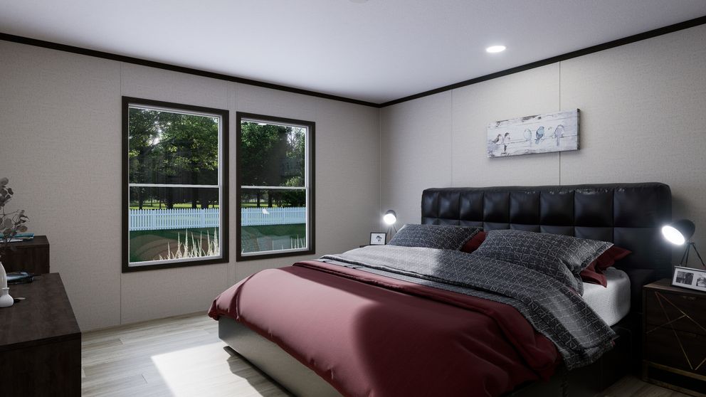 The PURPOSE Exterior. This Manufactured Mobile Home features 4 bedrooms and 2 baths.