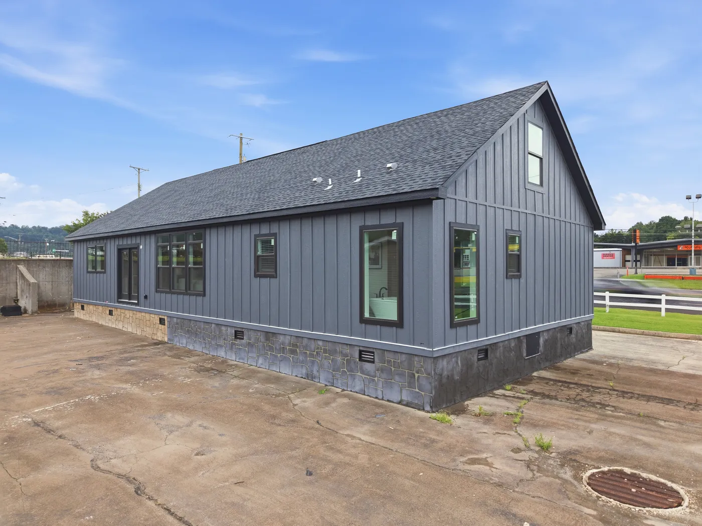 The THE SUMMIT Exterior. This Manufactured Mobile Home features 3 bedrooms and 2 baths.