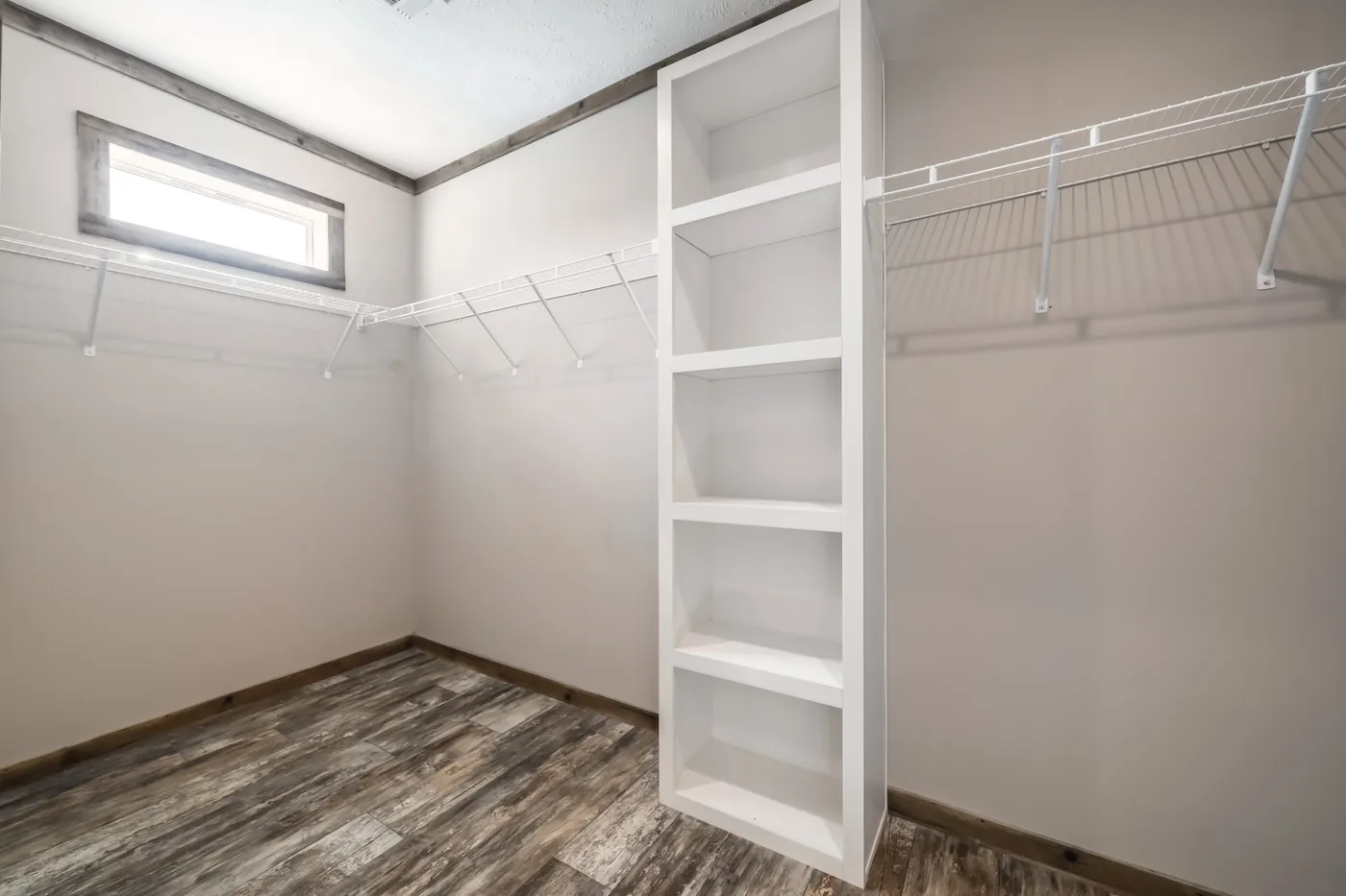 The THE TYRA Exterior. This Manufactured Mobile Home features 4 bedrooms and 2 baths.