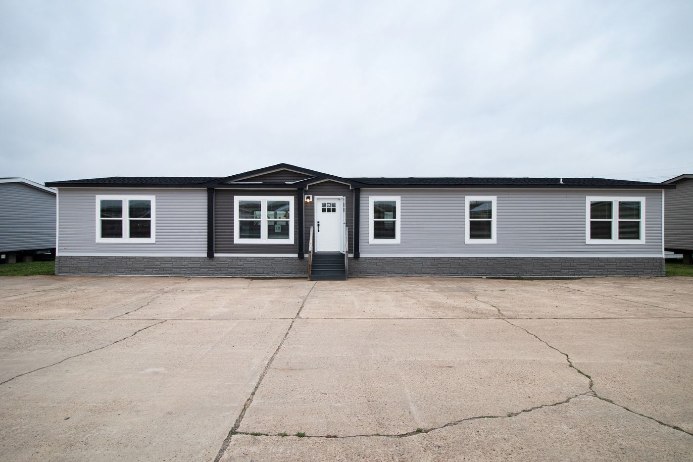 The HERCULES Exterior. This Manufactured Mobile Home features 4 bedrooms and 2 baths.