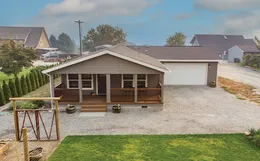 The INS561F SPRUCE         CLAYTON Exterior. This Manufactured Mobile Home features 3 bedrooms and 2 baths.