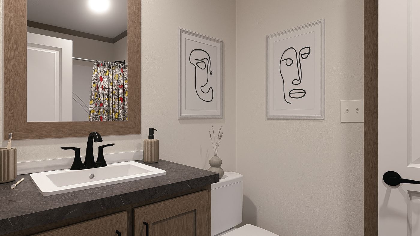 The NELLIE ELITE Exterior. This Manufactured Mobile Home features 4 bedrooms and 2 baths.