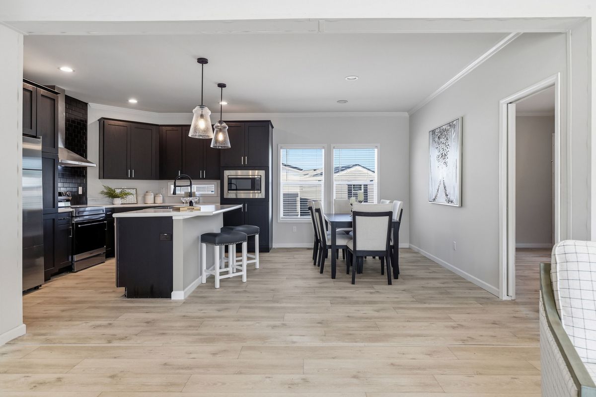 The THE FREEDOM GRAND 4BR 32X62 Exterior. This Manufactured Mobile Home features 4 bedrooms and 2 baths.