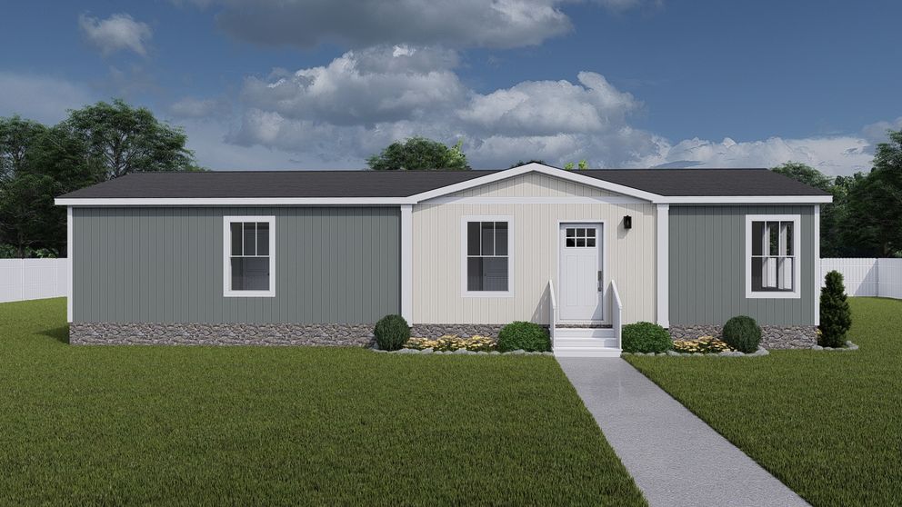 The THREE LITTLE BIRDS Exterior. This Manufactured Mobile Home features 3 bedrooms and 2 baths.