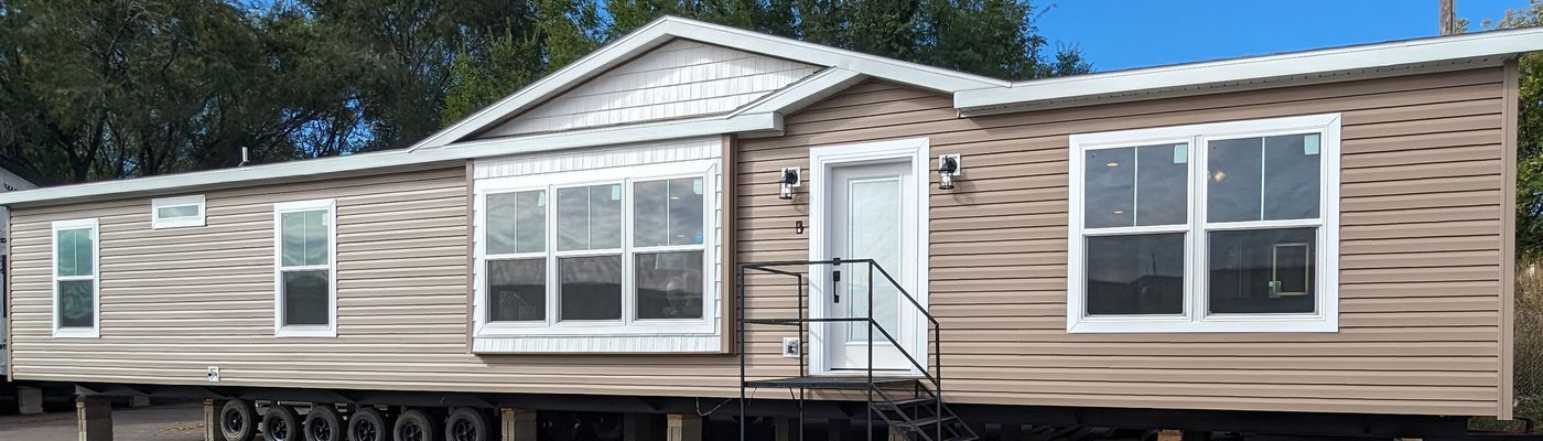 The LEGACY 327 Exterior. This Manufactured Mobile Home features 3 bedrooms and 2 baths.