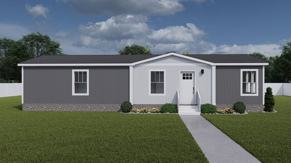 The THREE LITTLE BIRDS Exterior. This Manufactured Mobile Home features 3 bedrooms and 2 baths.