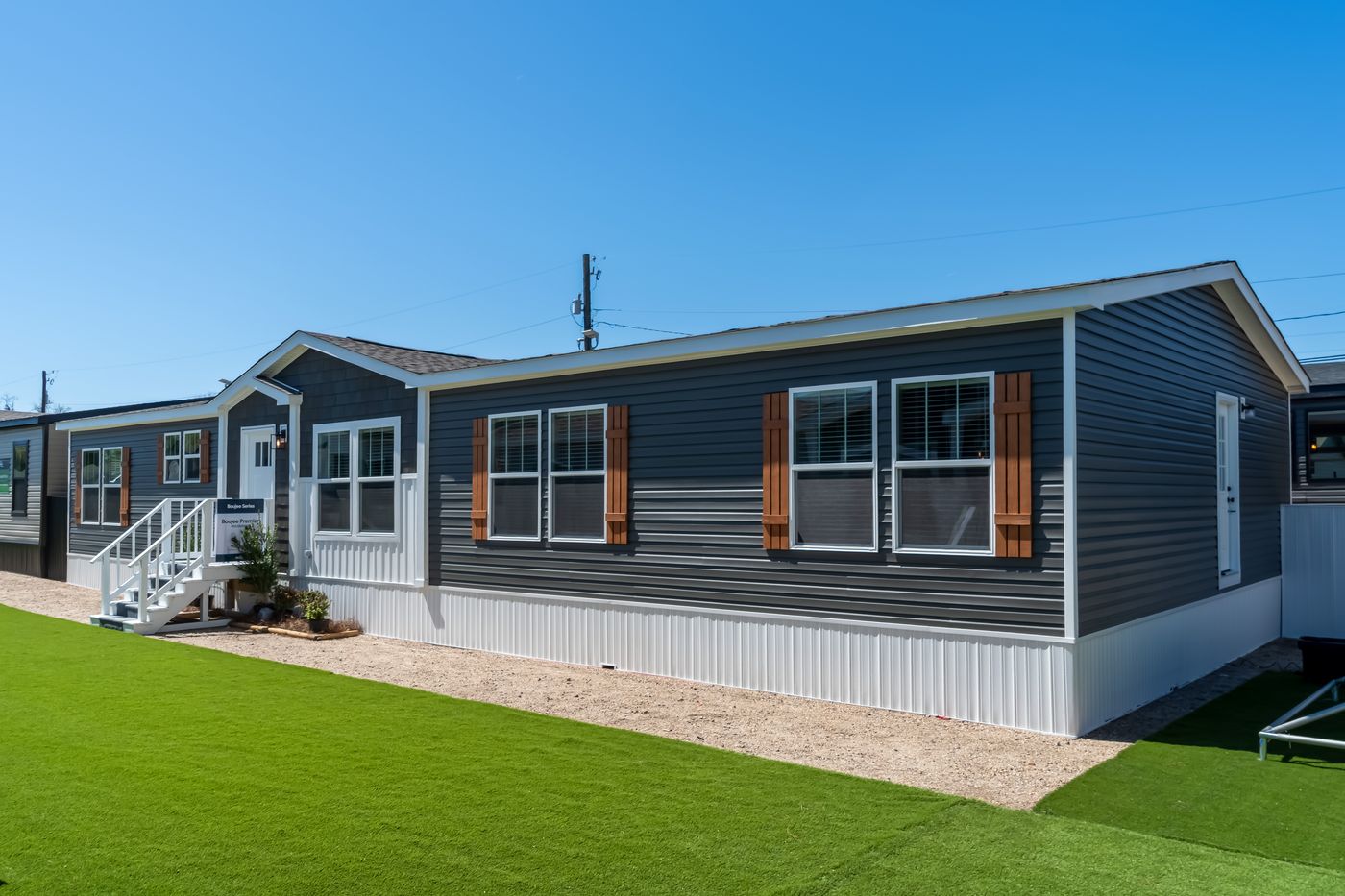The BOUJEE PREMIER Exterior. This Manufactured Mobile Home features 4 bedrooms and 2 baths.