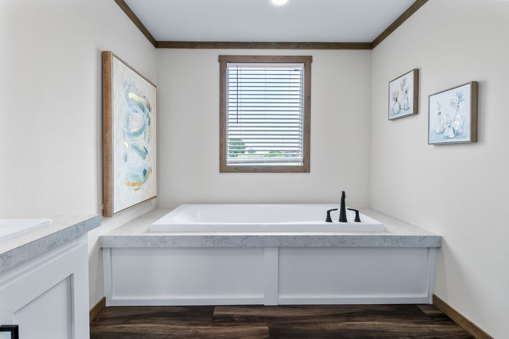 The EVERETT ELITE Exterior. This Manufactured Mobile Home features 4 bedrooms and 3 baths.