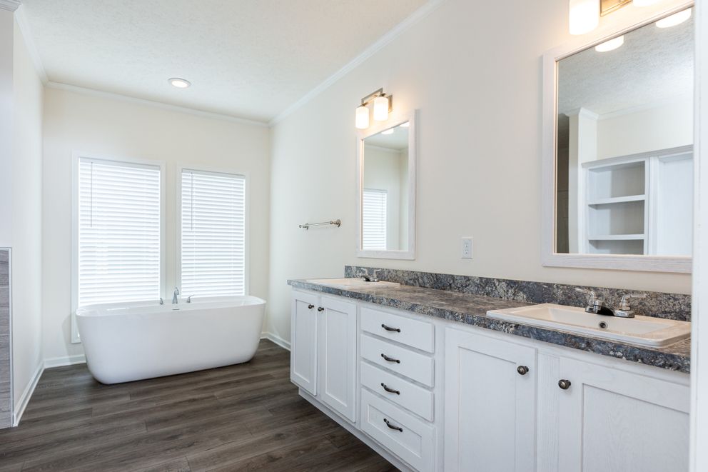 The 1454 CAROLINA Exterior. This Manufactured Mobile Home features 4 bedrooms and 2 baths.