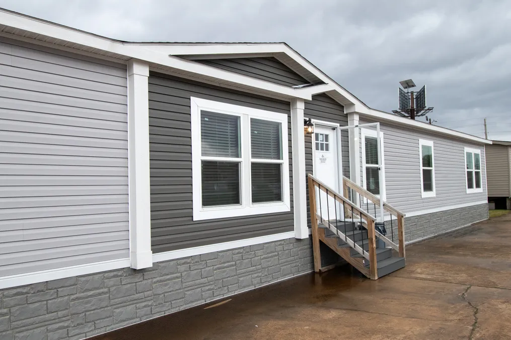 The HERCULES Exterior. This Manufactured Mobile Home features 4 bedrooms and 2 baths.