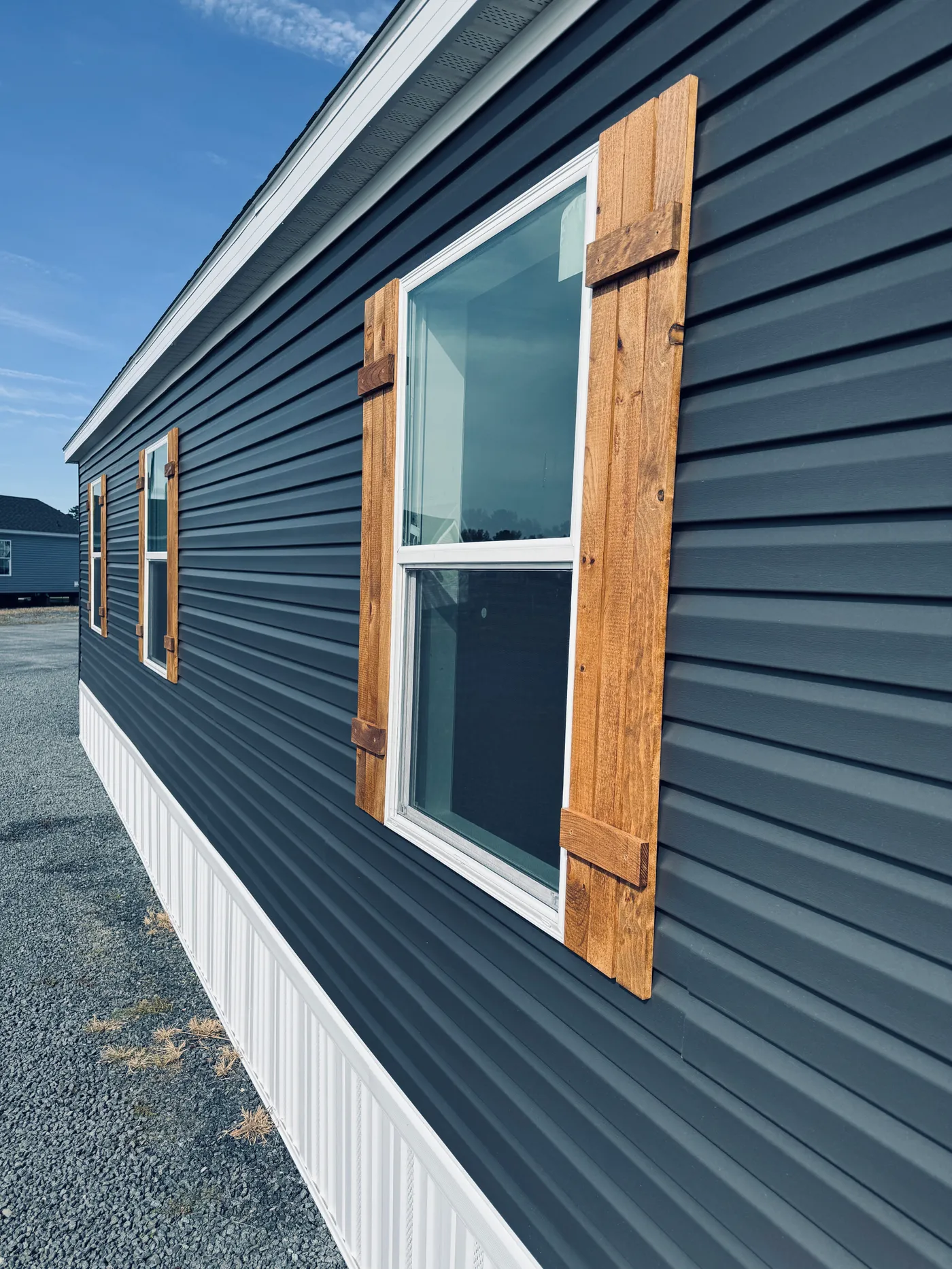 The TOURMALINE 7628-649 Exterior. This Manufactured Mobile Home features 4 bedrooms and 2 baths.