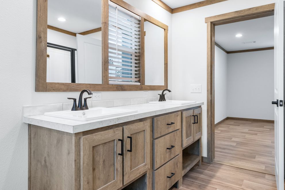 The EMILIE ELITE Exterior. This Manufactured Mobile Home features 3 bedrooms and 2 baths.