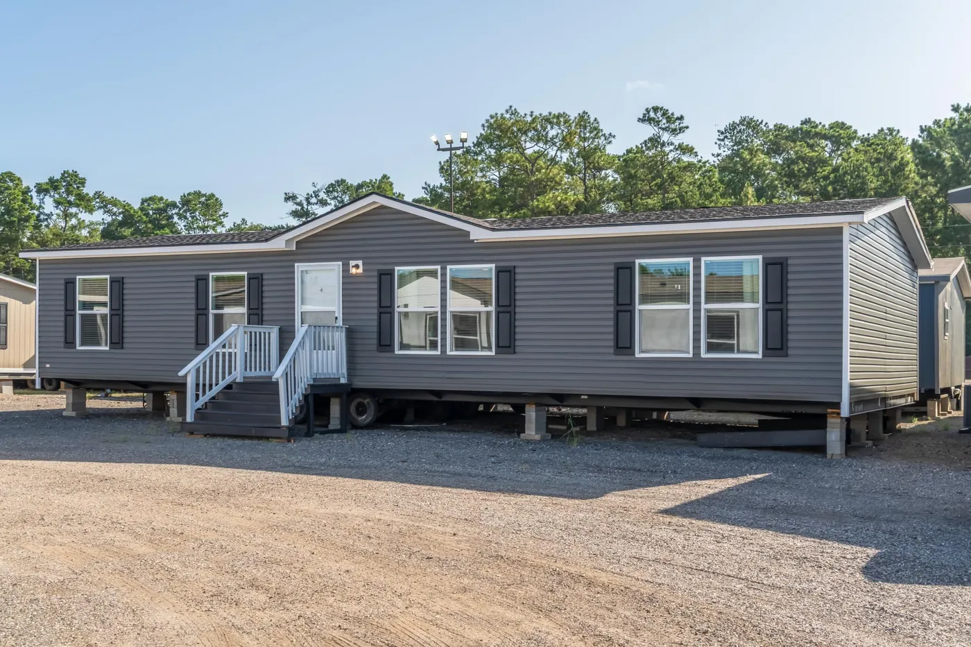 The ELEMENT Exterior. This Manufactured Mobile Home features 3 bedrooms and 2 baths.