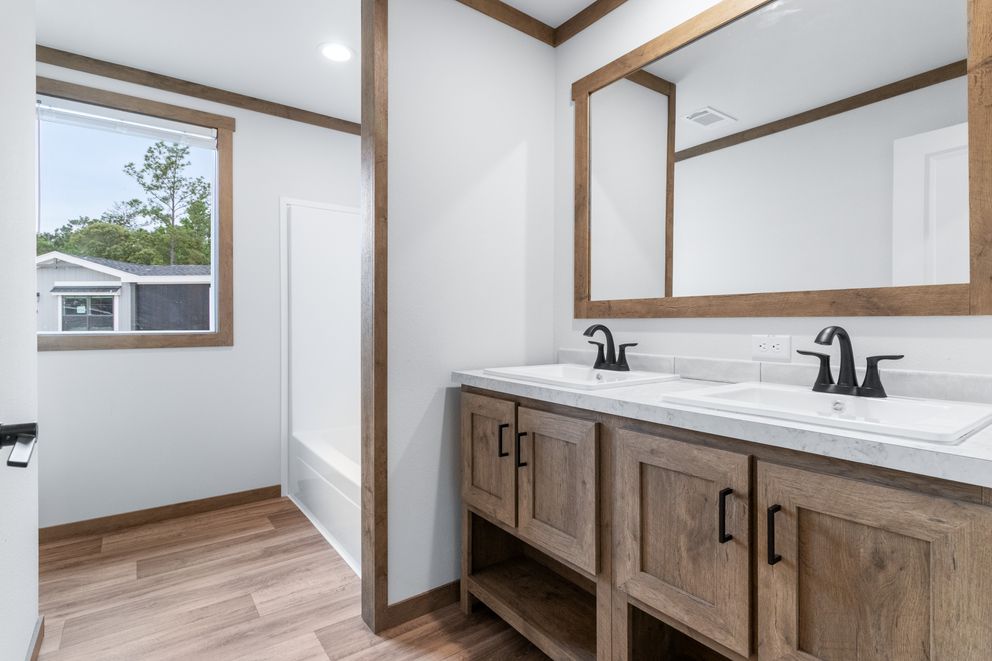 The EMILIE ELITE Exterior. This Manufactured Mobile Home features 3 bedrooms and 2 baths.