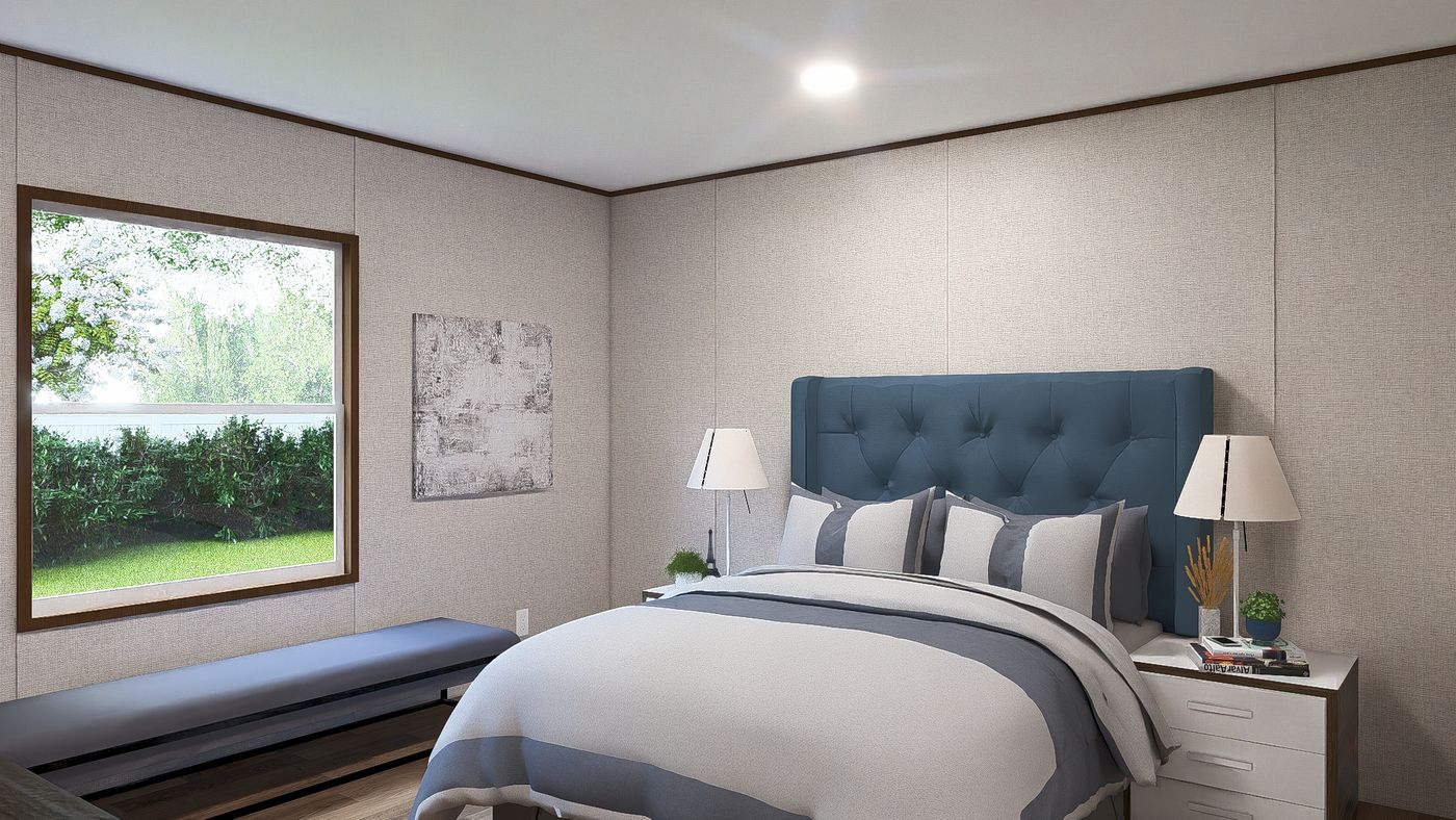 The MAPLE Exterior. This Manufactured Mobile Home features 3 bedrooms and 2 baths.