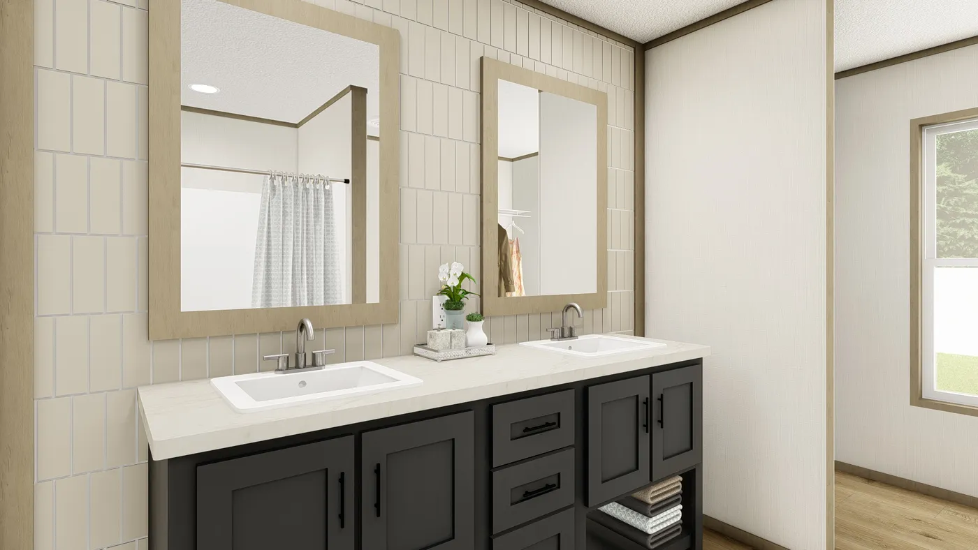 The EXPLORER NEW Exterior. This Manufactured Mobile Home features 3 bedrooms and 2 baths.