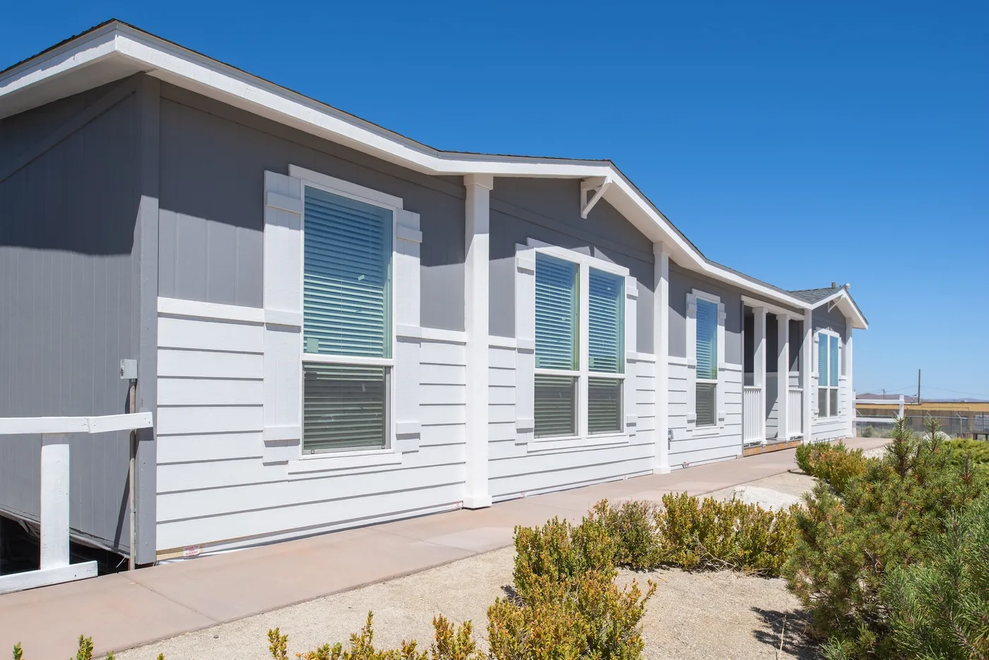 The HCP 4260-4A            LORETTA Exterior. This Manufactured Mobile Home features 4 bedrooms and 3 baths.