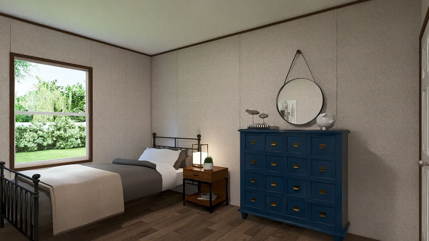 The SPRUCE Exterior. This Manufactured Mobile Home features 3 bedrooms and 2 baths.