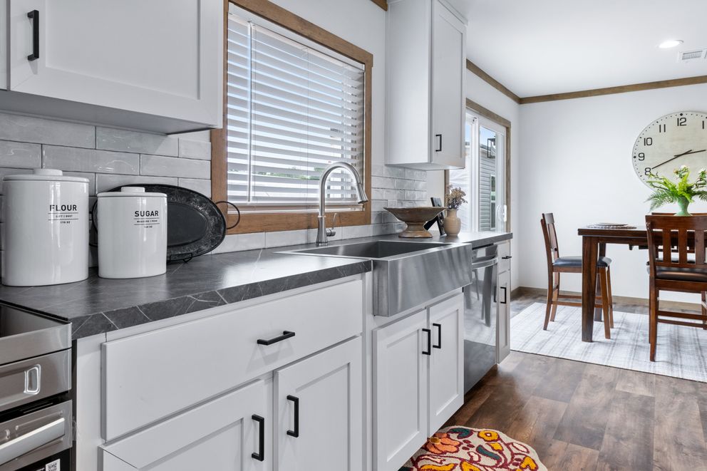The FARM 3 FLEX ELITE DEN Exterior. This Manufactured Mobile Home features 3 bedrooms and 2 baths.