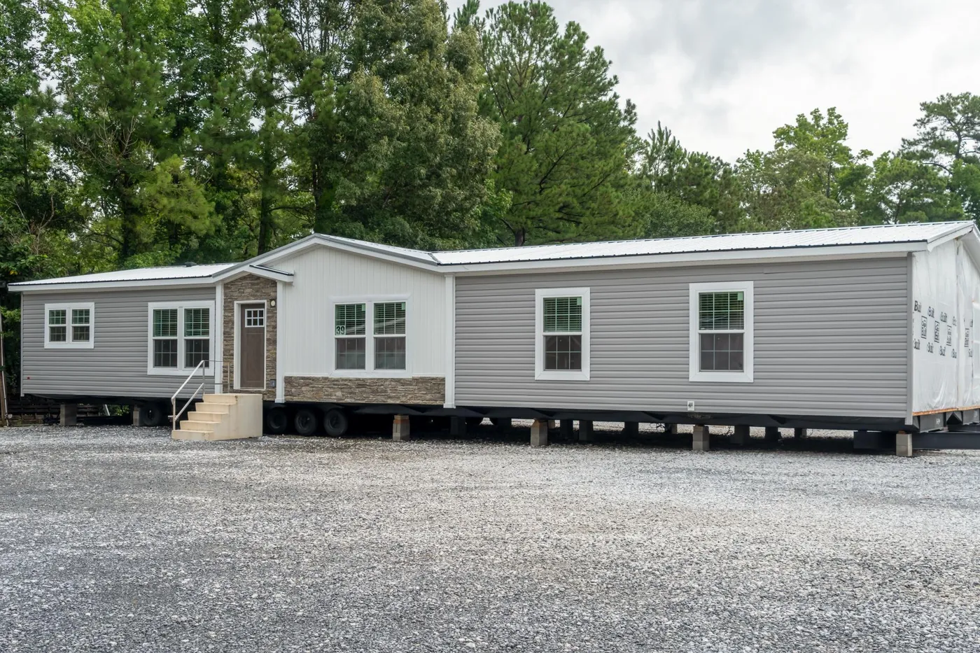 The THE CAROLINA Exterior. This Manufactured Mobile Home features 4 bedrooms and 2 baths.