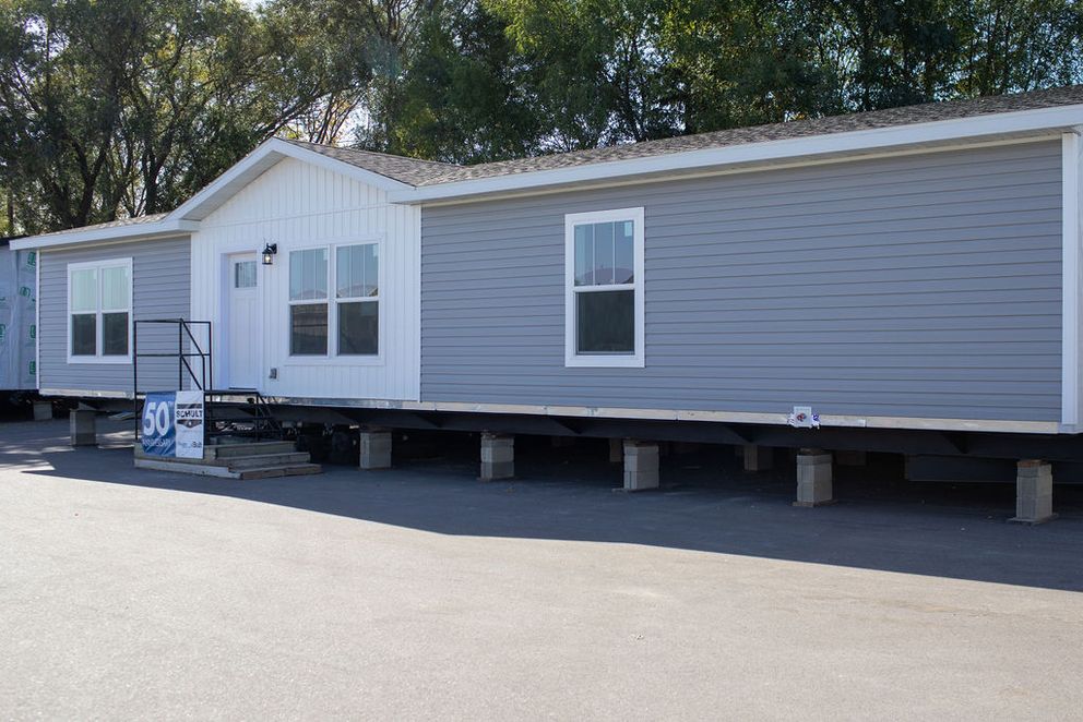 The BROWN EYED GIRL Exterior. This Manufactured Mobile Home features 4 bedrooms and 2 baths.