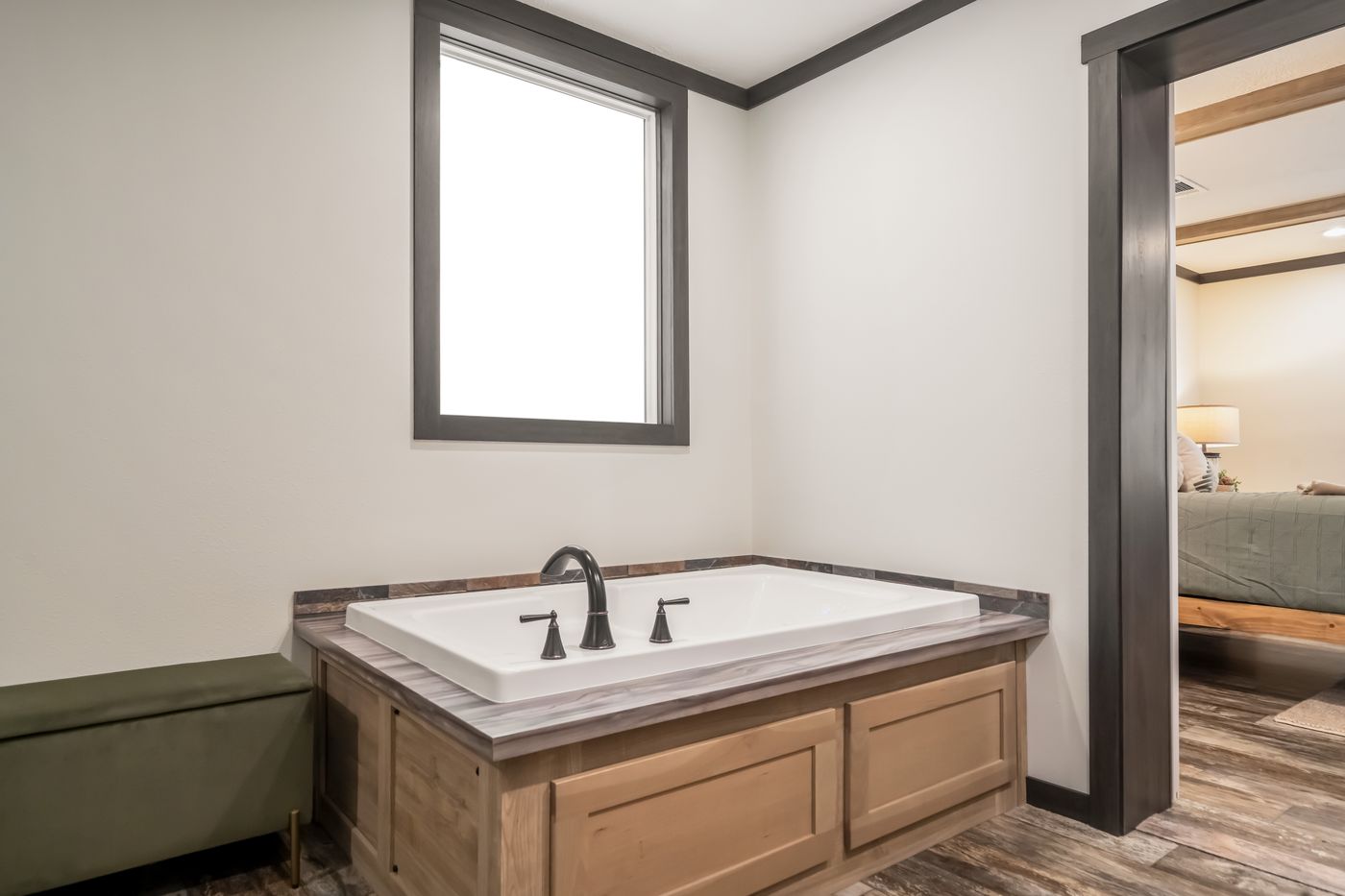 The BOUJEE LUX Exterior. This Manufactured Mobile Home features 4 bedrooms and 3 baths.