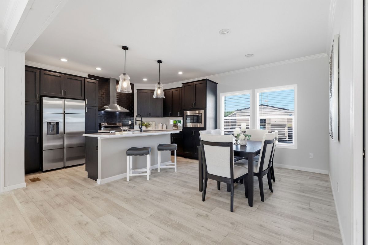 The THE FREEDOM GRAND 4BR 32X62 Exterior. This Manufactured Mobile Home features 4 bedrooms and 2 baths.