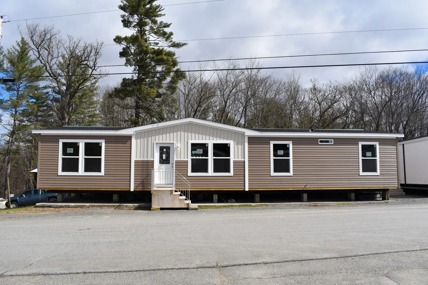 The MOONSTONE 60 Exterior. This Manufactured Mobile Home features 3 bedrooms and 2 baths.