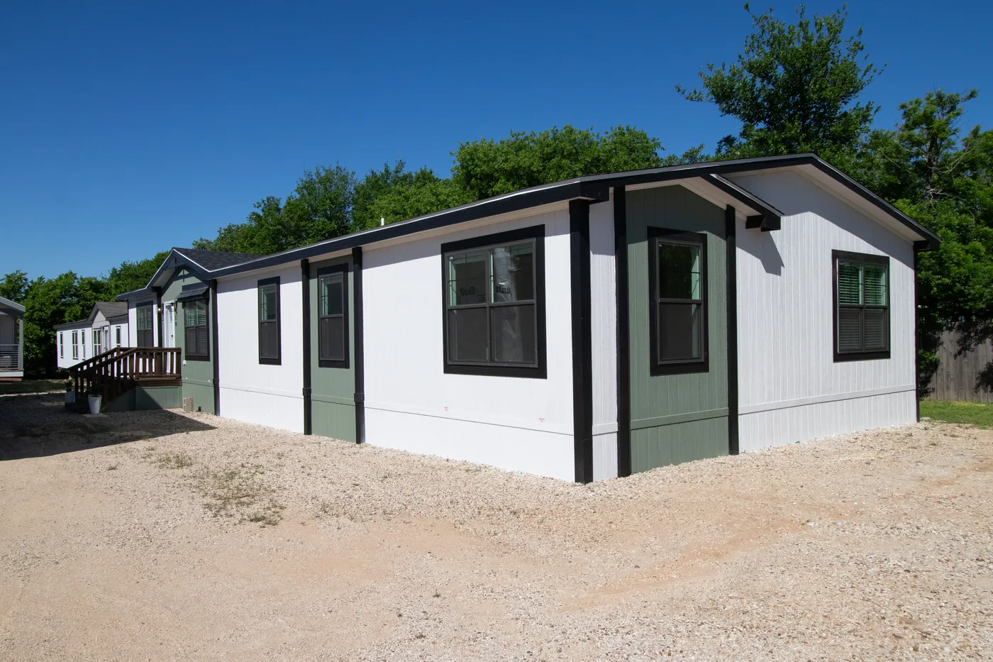 The FARM 4 FLEX ELITE Exterior. This Manufactured Mobile Home features 4 bedrooms and 3 baths.