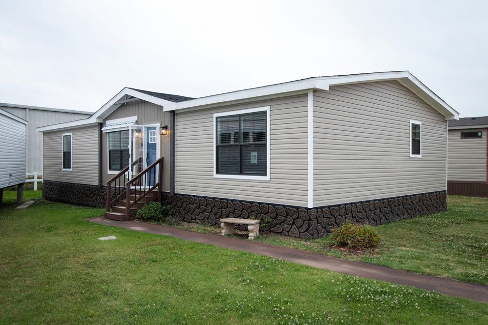 The LIZZIE Exterior. This Manufactured Mobile Home features 3 bedrooms and 2 baths.