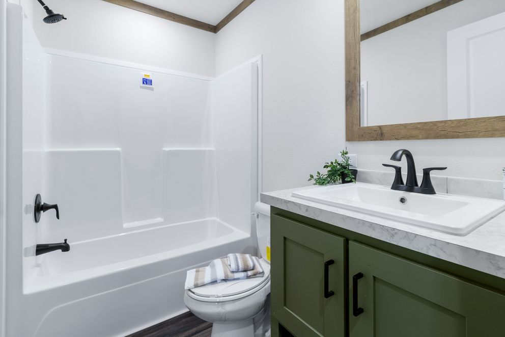 The LEVI Exterior. This Manufactured Mobile Home features 2 bedrooms and 2 baths.