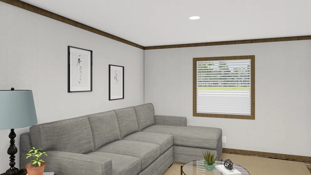 The HOMESTEAD BREEZE Family Room. This Manufactured Mobile Home features 4 bedrooms and 2 baths.