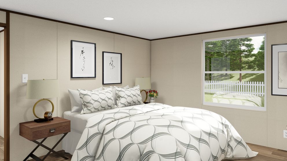 The GRAND Primary Bedroom. This Manufactured Mobile Home features 4 bedrooms and 2 baths.