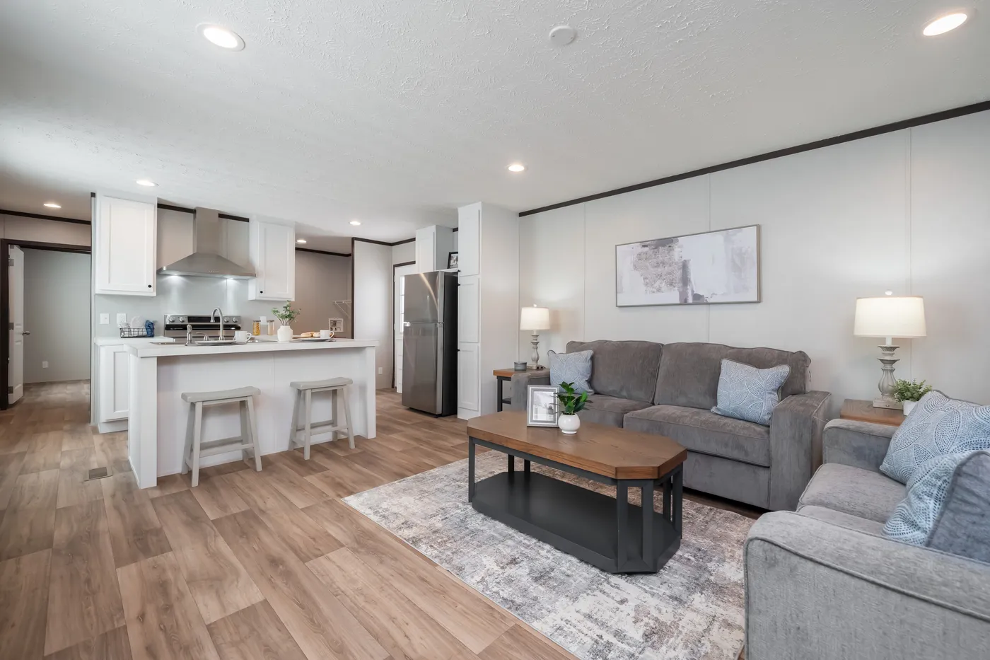 The DYNAMIC Living Room. This Manufactured Mobile Home features 3 bedrooms and 2 baths.