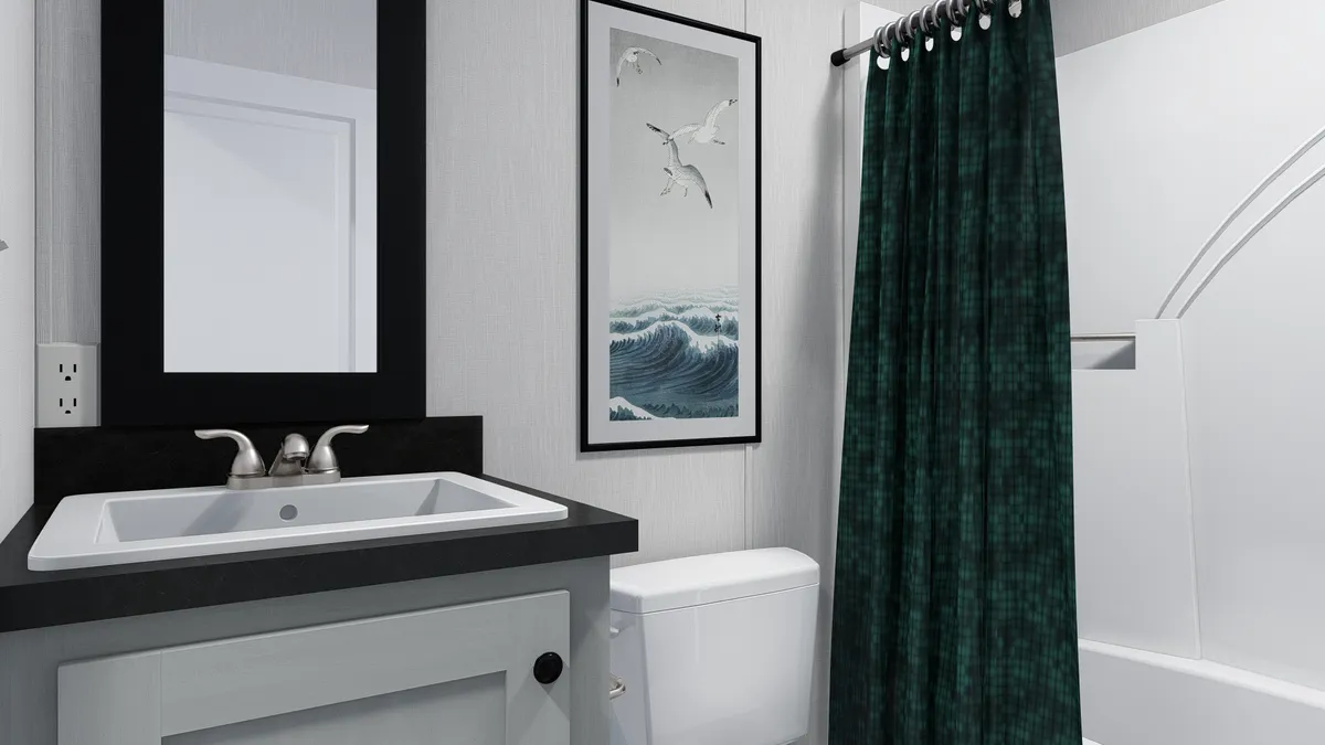 The 6016-4791 THE PULSE Guest Bathroom. This Manufactured Mobile Home features 2 bedrooms and 2 baths.