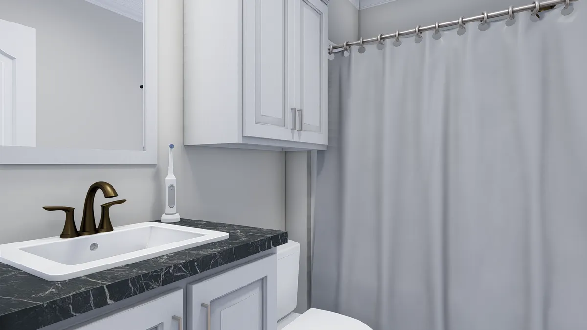 The THE BIG EASY Guest Bathroom. This Manufactured Mobile Home features 4 bedrooms and 3 baths.
