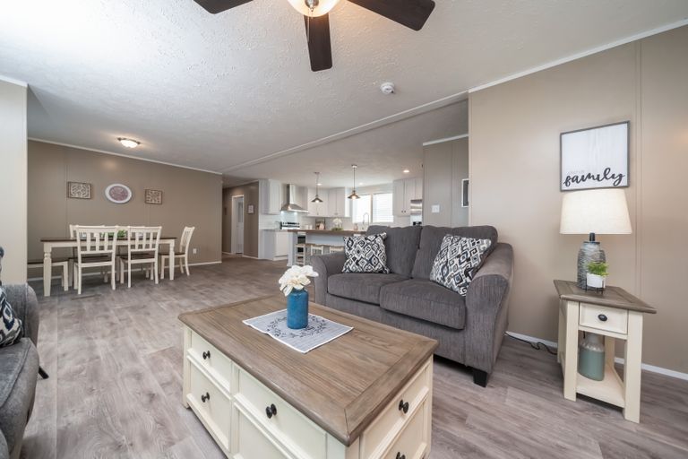 The ISLAND BREEZE Living Room. This Manufactured Mobile Home features 3 bedrooms and 2 baths.