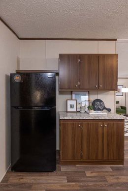 The PRIDE Kitchen. This Manufactured Mobile Home features 4 bedrooms and 2 baths.