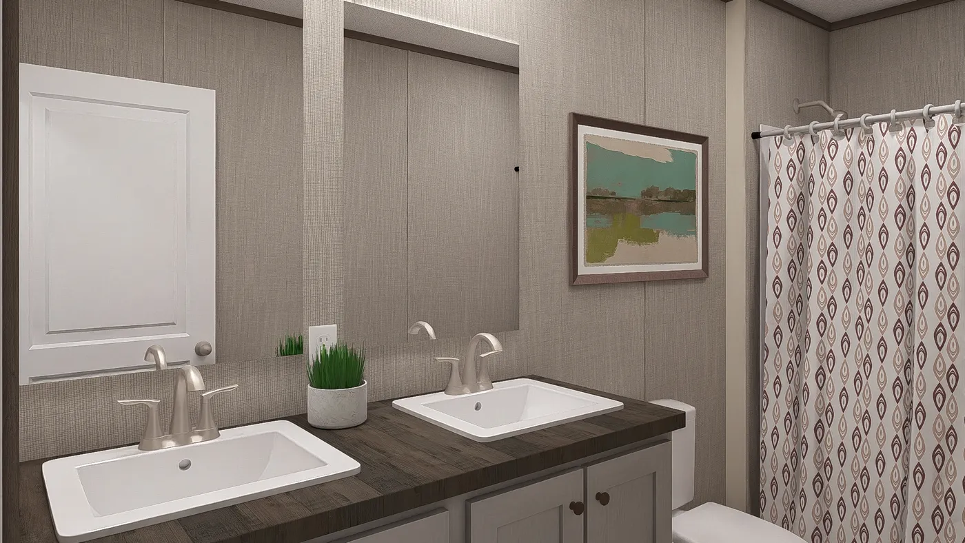 The ULTRA PRO BIG BOY 4 BR 32X76 Guest Bathroom. This Manufactured Mobile Home features 4 bedrooms and 2 baths.
