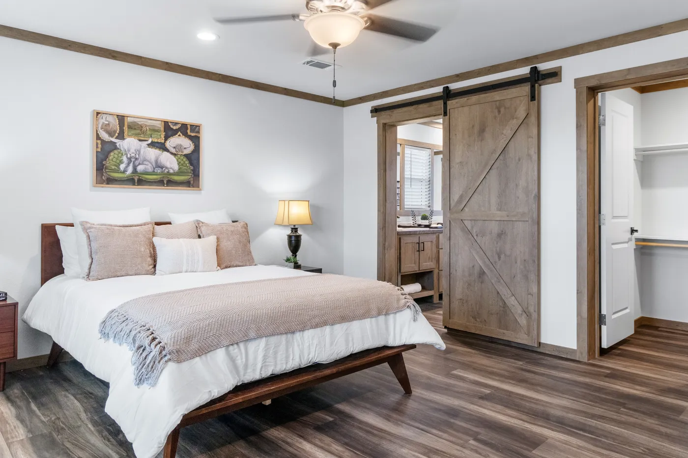 The ISABELLA ELITE Primary Bedroom. This Manufactured Mobile Home features 3 bedrooms and 2 baths.