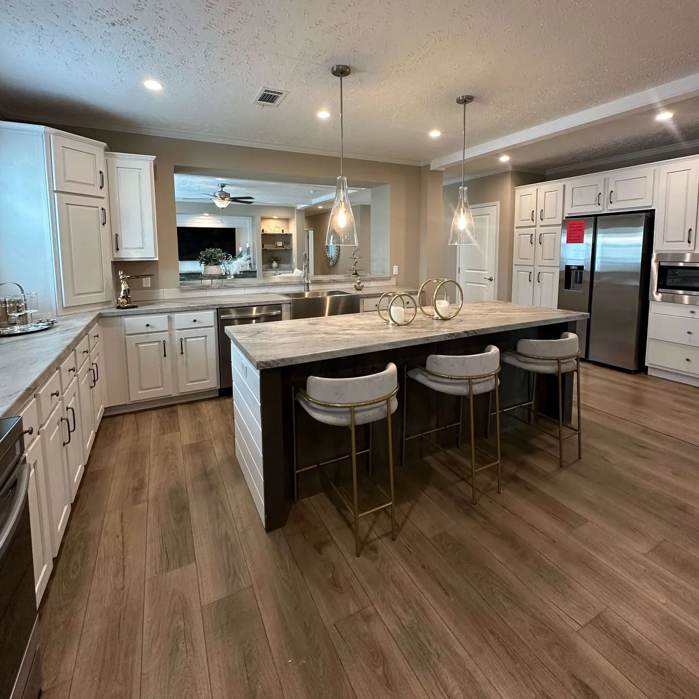 The THE HEXAGON Kitchen. This Manufactured Mobile Home features 4 bedrooms and 3 baths.