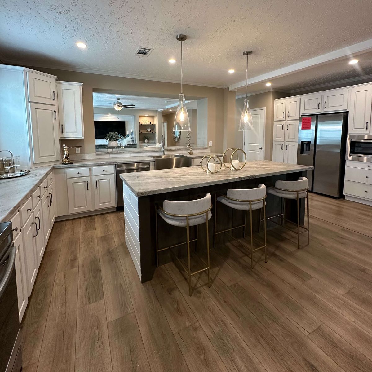 The THE HEXAGON Kitchen. This Manufactured Mobile Home features 4 bedrooms and 3 baths.