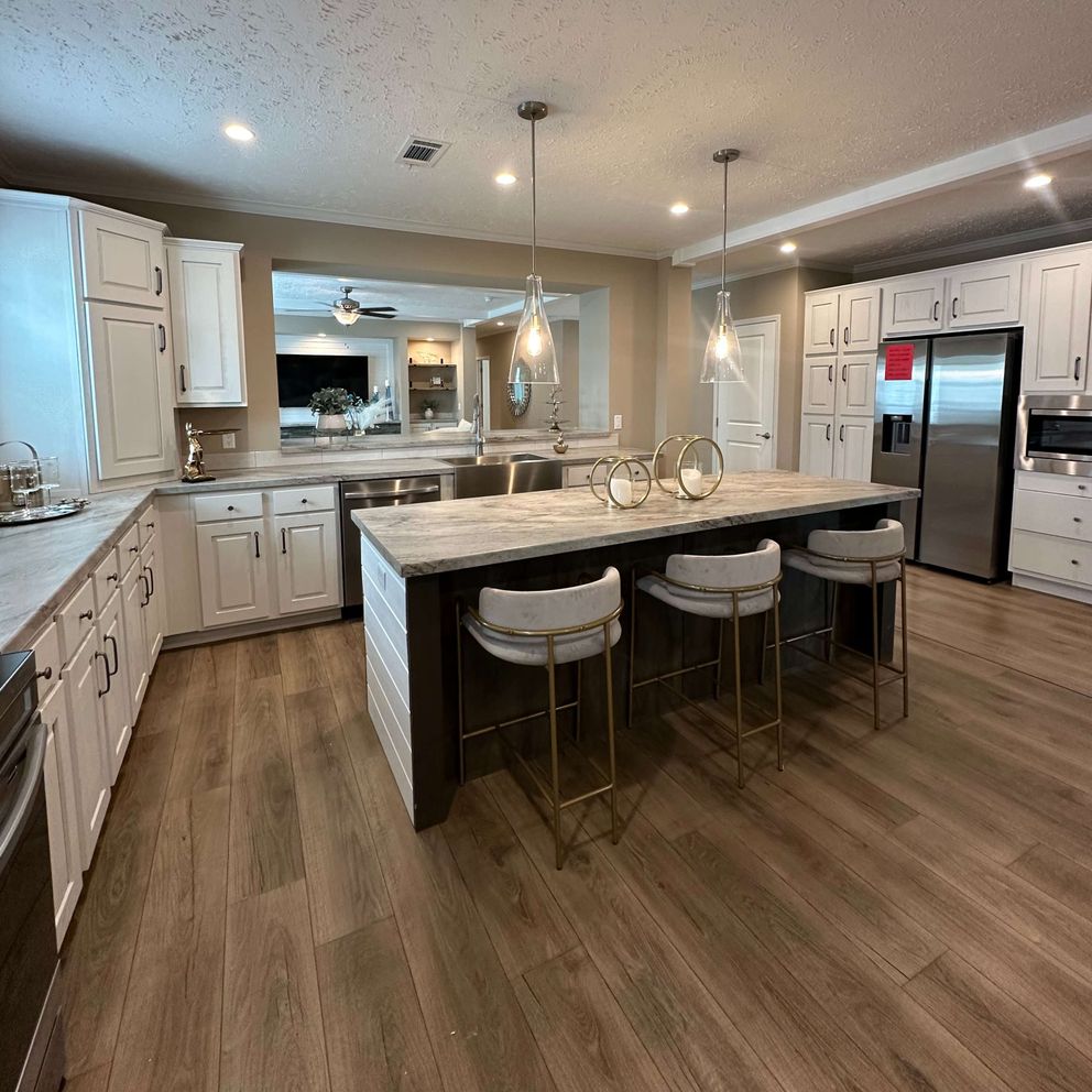 The THE HEXAGON Kitchen. This Manufactured Mobile Home features 4 bedrooms and 3 baths.