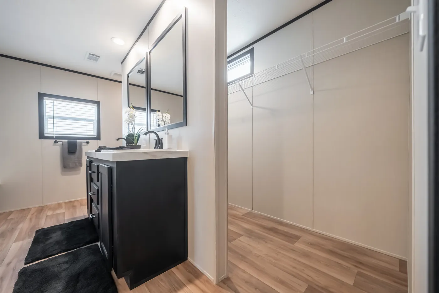 The THE ANNIVERSARY 2.1 Primary Bathroom. This Manufactured Mobile Home features 3 bedrooms and 2 baths.