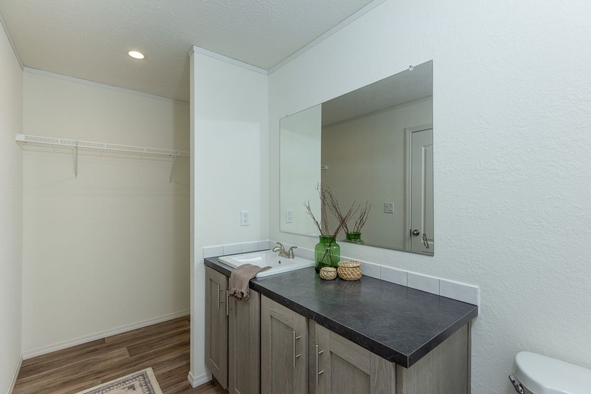 The LIFESTYLE 208 Primary Bathroom. This Manufactured Mobile Home features 3 bedrooms and 2 baths.