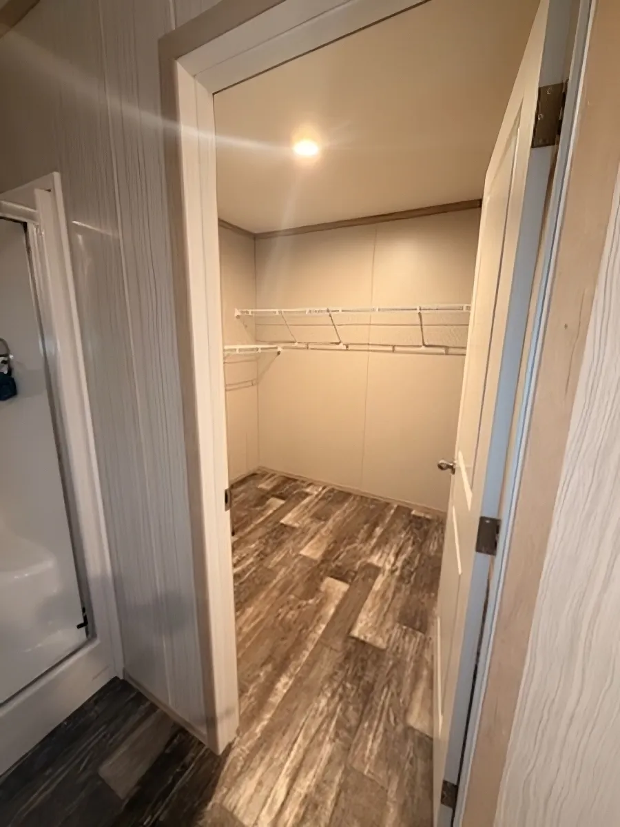 The AMETHYST Walk in closet for Primary Bedroom.