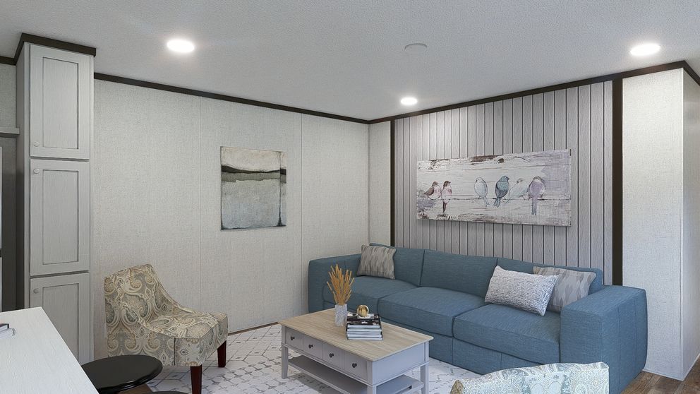 The INTUITION Living Room. This Manufactured Mobile Home features 3 bedrooms and 2 baths.
