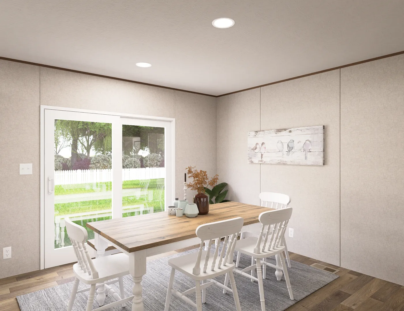 The REDWOOD Dining Area. This Manufactured Mobile Home features 5 bedrooms and 3 baths.